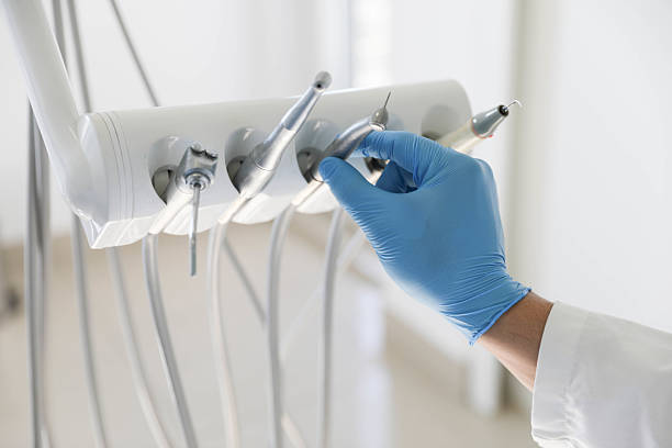 Professional Root Canal Treatment technician working in Midland City, AL